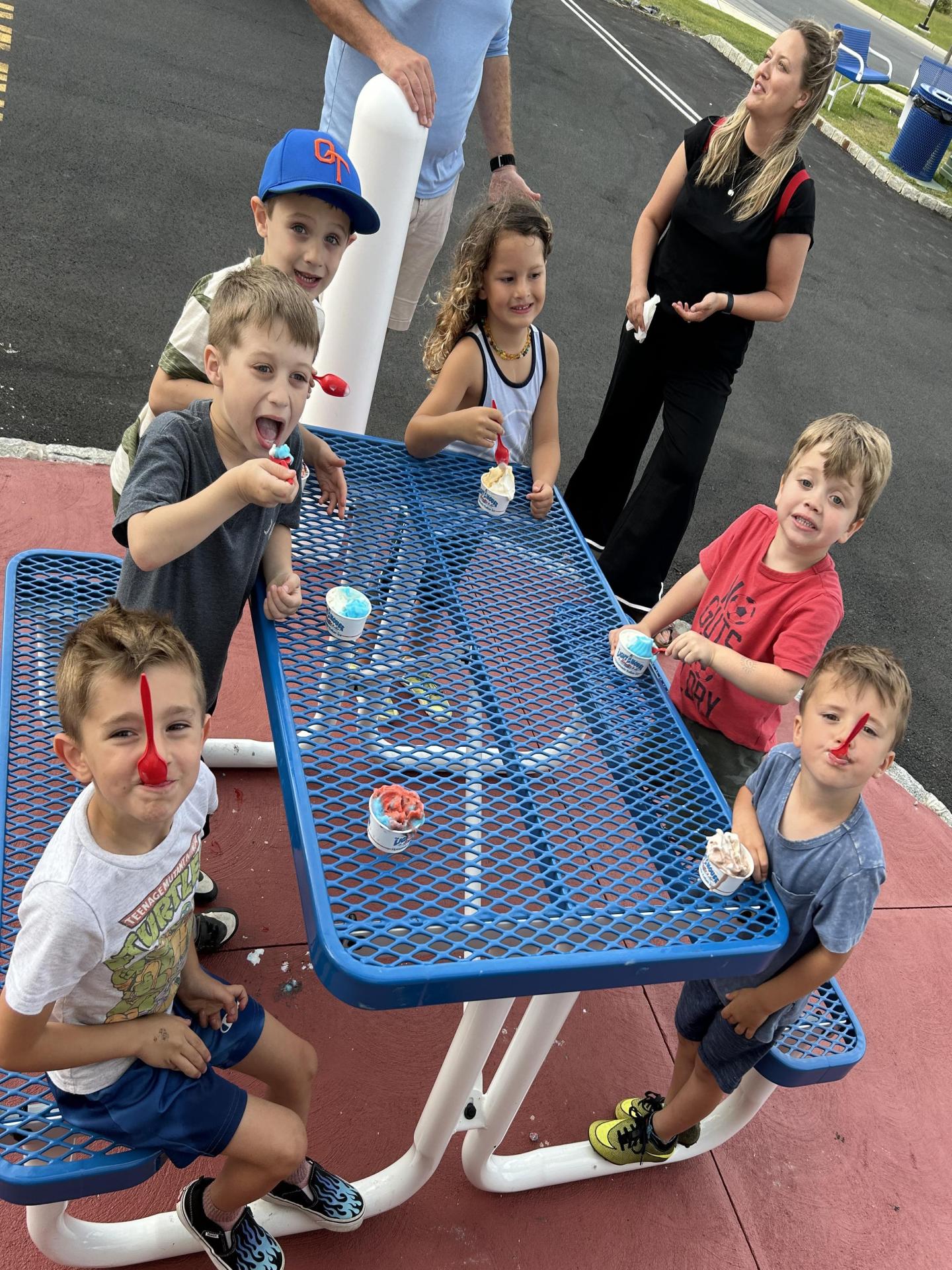 Ocean Township Little League Team eating ice cream